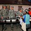 Photo: Nellis Air Force Base airmen serve dinner to the h Photo: Nellis Air Force Base airmen serve dinner to the h